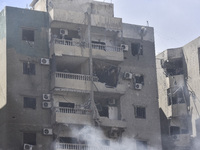 The destruction at the site of an overnight Israeli airstrike on the Laylaki, Harat Hreik, and Sant Tares neighborhoods in Beirut's southern...