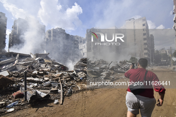 The destruction at the site of an overnight Israeli airstrike on the Laylaki, Harat Hreik, and Sant Tares neighborhoods in Beirut's southern...