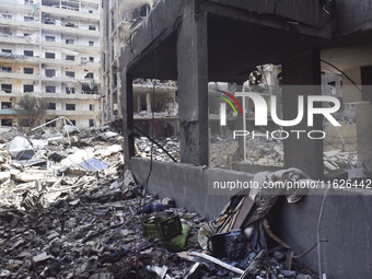 The destruction at the site of an overnight Israeli airstrike on the Laylaki, Harat Hreik, and Sant Tares neighborhoods in Beirut's southern...