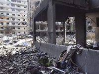 The destruction at the site of an overnight Israeli airstrike on the Laylaki, Harat Hreik, and Sant Tares neighborhoods in Beirut's southern...