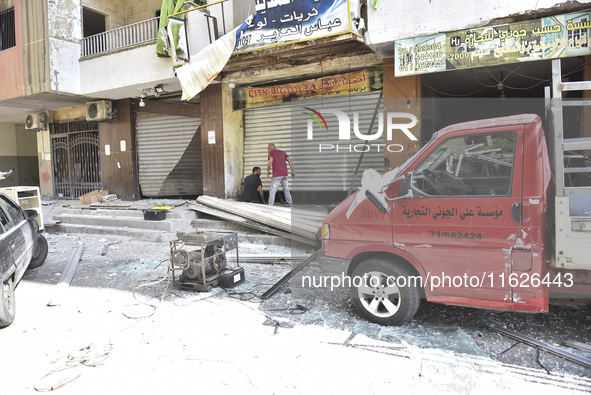 The destruction at the site of an overnight Israeli airstrike on the Laylaki, Harat Hreik, and Sant Tares neighborhoods in Beirut's southern...