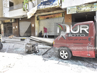 The destruction at the site of an overnight Israeli airstrike on the Laylaki, Harat Hreik, and Sant Tares neighborhoods in Beirut's southern...