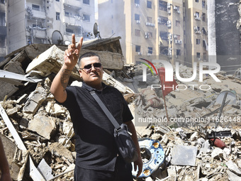 The destruction at the site of an overnight Israeli airstrike on the Laylaki, Harat Hreik, and Sant Tares neighborhoods in Beirut's southern...