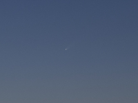 Comet C/2023 A3 (Tsuchinshan-ATLAS) rises above the skies of Barcelona, Spain, on a clear night. Discovered in January 2023, this comet orig...