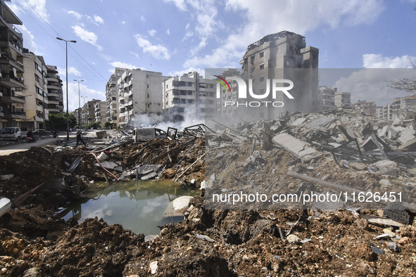 The destruction at the site of an overnight Israeli airstrike on the Laylaki, Harat Hreik, and Sant Tares neighborhoods in Beirut's southern...