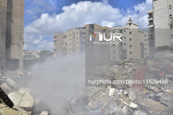 The destruction at the site of an overnight Israeli airstrike on the Laylaki, Harat Hreik, and Sant Tares neighborhoods in Beirut's southern...