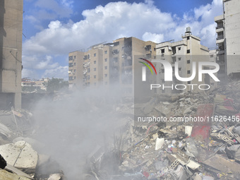 The destruction at the site of an overnight Israeli airstrike on the Laylaki, Harat Hreik, and Sant Tares neighborhoods in Beirut's southern...