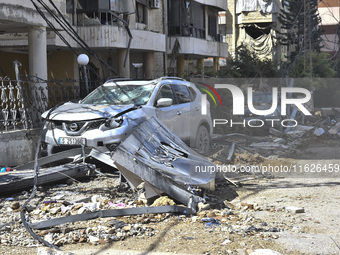 The destruction at the site of an overnight Israeli airstrike on the Laylaki, Harat Hreik, and Sant Tares neighborhoods in Beirut's southern...