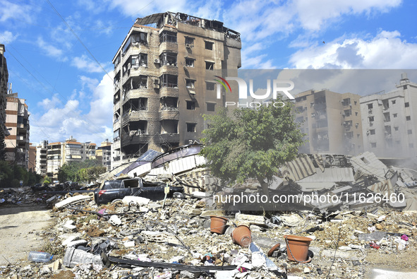 The destruction at the site of an overnight Israeli airstrike on the Laylaki, Harat Hreik, and Sant Tares neighborhoods in Beirut's southern...