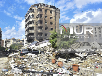 The destruction at the site of an overnight Israeli airstrike on the Laylaki, Harat Hreik, and Sant Tares neighborhoods in Beirut's southern...