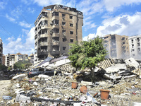 The destruction at the site of an overnight Israeli airstrike on the Laylaki, Harat Hreik, and Sant Tares neighborhoods in Beirut's southern...