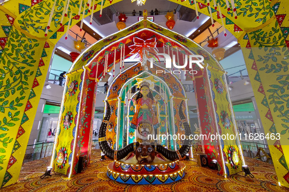 A Goddess Durga idol is seen at a Pandal, a temporary place of worship, at a shopping mall in Kolkata, India, on October 1, 2024. 