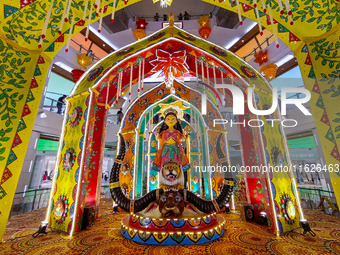 A Goddess Durga idol is seen at a Pandal, a temporary place of worship, at a shopping mall in Kolkata, India, on October 1, 2024. (