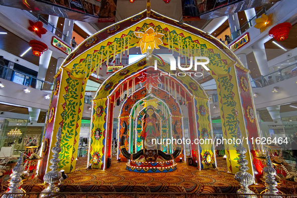 A Goddess Durga idol is seen at a Pandal, a temporary place of worship, at a shopping mall in Kolkata, India, on October 1, 2024. 