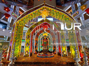 A Goddess Durga idol is seen at a Pandal, a temporary place of worship, at a shopping mall in Kolkata, India, on October 1, 2024. (