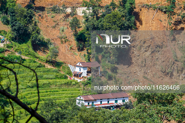 Nakhu River flooding damages homes in the Tikabhairab region of southern Lalitpur, Nepal, on October 1, 2024. Homes are severely damaged, wi...