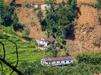 Nakhu River flooding damages homes in the Tikabhairab region of southern Lalitpur, Nepal, on October 1, 2024. Homes are severely damaged, wi...