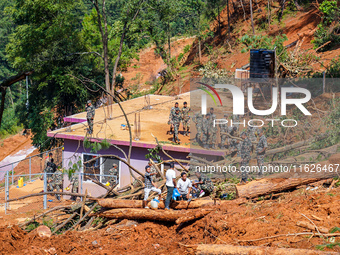 Rescue teams search for missing people in the Tikabhairab landslides caused by heavy rainfall in southern Lalitpur, Nepal, on October 01, 20...