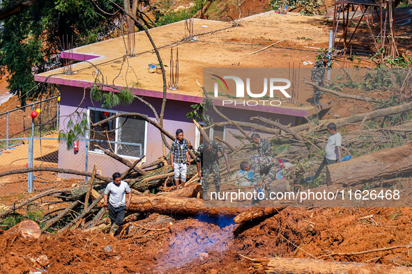 Rescue teams search for missing people in the Tikabhairab landslides caused by heavy rainfall in southern Lalitpur, Nepal, on October 01, 20...