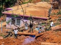 Rescue teams search for missing people in the Tikabhairab landslides caused by heavy rainfall in southern Lalitpur, Nepal, on October 01, 20...