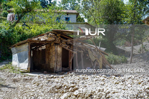 Nakhu River flooding damages homes in the Tikabhairab region of southern Lalitpur, Nepal, on October 1, 2024. Homes are severely damaged, wi...