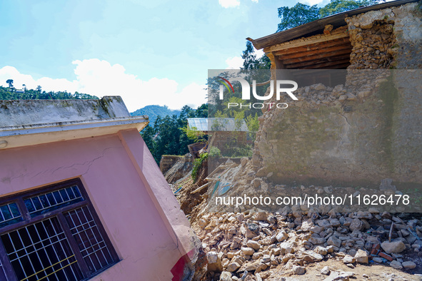 Nakhu River flooding damages homes in the Tikabhairab region of southern Lalitpur, Nepal, on October 1, 2024. Homes are severely damaged, wi...