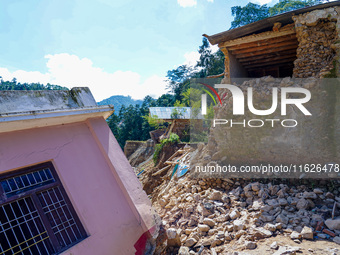 Nakhu River flooding damages homes in the Tikabhairab region of southern Lalitpur, Nepal, on October 1, 2024. Homes are severely damaged, wi...