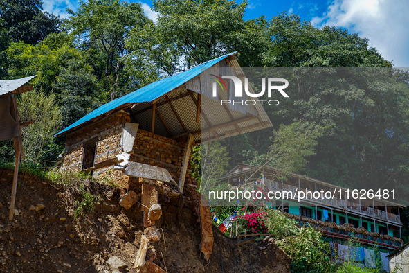 Nakhu River flooding damages homes in the Tikabhairab region of southern Lalitpur, Nepal, on October 1, 2024. Homes are severely damaged, wi...