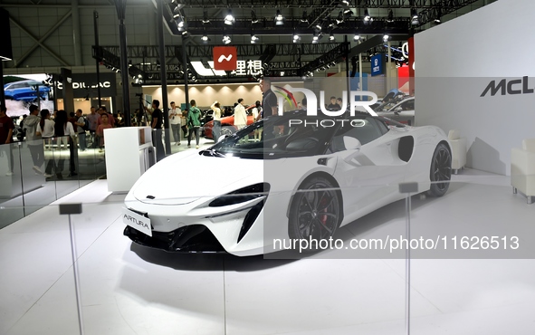 People visit the 2024 Hefei International New Energy Vehicle Exhibition in Hefei, China, on October 1, 2024. 