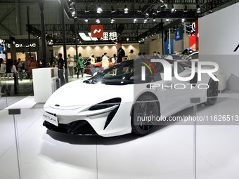 People visit the 2024 Hefei International New Energy Vehicle Exhibition in Hefei, China, on October 1, 2024. (