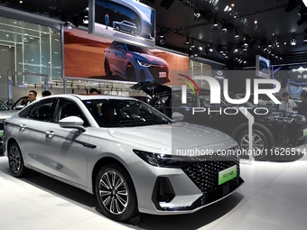 People visit the 2024 Hefei International New Energy Vehicle Exhibition in Hefei, China, on October 1, 2024. (