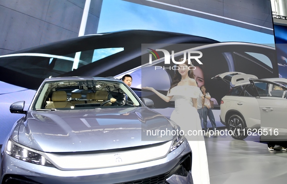 People visit the 2024 Hefei International New Energy Vehicle Exhibition in Hefei, China, on October 1, 2024. 