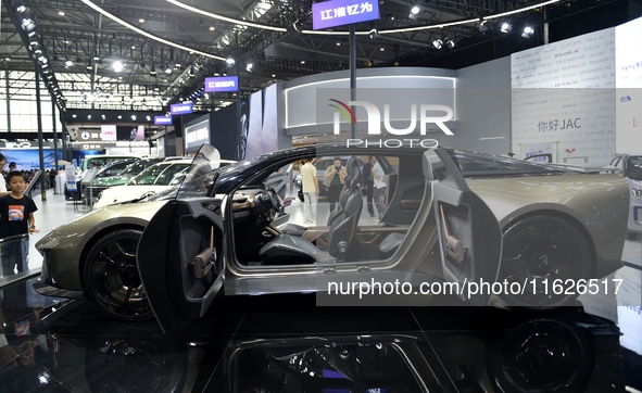 People visit the 2024 Hefei International New Energy Vehicle Exhibition in Hefei, China, on October 1, 2024. 