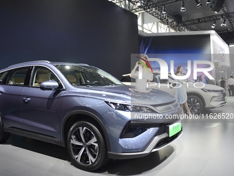 People visit the 2024 Hefei International New Energy Vehicle Exhibition in Hefei, China, on October 1, 2024. (