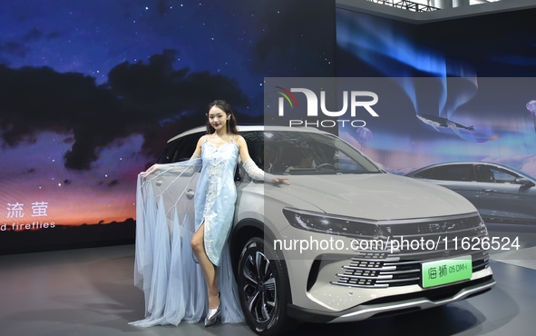 People visit the 2024 Hefei International New Energy Vehicle Exhibition in Hefei, China, on October 1, 2024. 