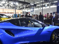 People visit the 2024 Hefei International New Energy Vehicle Exhibition in Hefei, China, on October 1, 2024. (