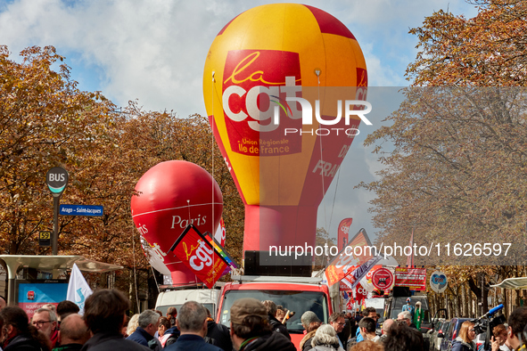 Demonstrators took part in a protest organized by the CGT union for strike action, demanding the repeal of the pension reform and higher wag...