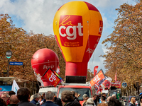 Demonstrators took part in a protest organized by the CGT union for strike action, demanding the repeal of the pension reform and higher wag...