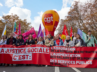 Demonstrators took part in a protest organized by the CGT union for strike action, demanding the repeal of the pension reform and higher wag...