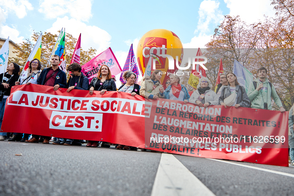 Demonstrators took part in a protest organized by the CGT union for strike action, demanding the repeal of the pension reform and higher wag...