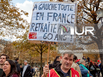 Demonstrators took part in a protest organized by the CGT union for strike action, demanding the repeal of the pension reform and higher wag...