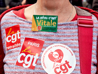 Demonstrators took part in a protest organized by the CGT union for strike action, demanding the repeal of the pension reform and higher wag...