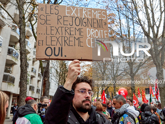 Demonstrators took part in a protest organized by the CGT union for strike action, demanding the repeal of the pension reform and higher wag...