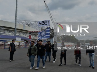 Hundreds of Arema FC supporters march to Kanjuruhan Stadium to mark the second anniversary of the football disaster that killed 135 people....