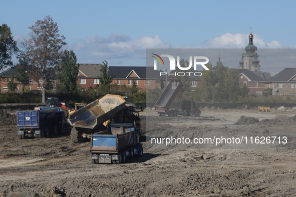 Construction begins for a new housing subdivision in Markham, Ontario, Canada, on September 30, 2024. 