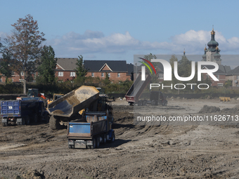 Construction begins for a new housing subdivision in Markham, Ontario, Canada, on September 30, 2024. (