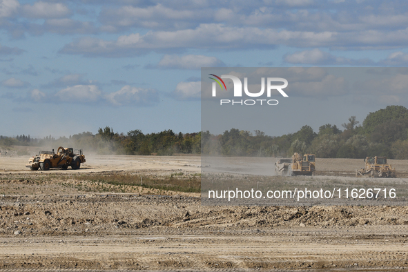 Construction begins for a new housing subdivision in Markham, Ontario, Canada, on September 30, 2024. 