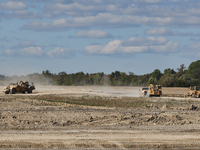 Construction begins for a new housing subdivision in Markham, Ontario, Canada, on September 30, 2024. (