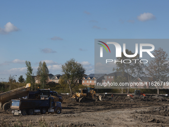 Construction begins for a new housing subdivision in Markham, Ontario, Canada, on September 30, 2024. (