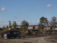 Construction begins for a new housing subdivision in Markham, Ontario, Canada, on September 30, 2024. (